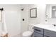 Clean bathroom showcasing white tile, modern fixtures, and updated vanity at 1020 Stuart, Denver, CO 80204