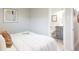 Comfortable bedroom with ensuite bathroom, featuring modern decor and natural light at 1020 Stuart, Denver, CO 80204