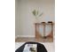 Living room area showcasing decorative table, art, and modern decor at 1020 Stuart, Denver, CO 80204