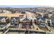 Aerial view of backyard with patio, fence, and ' play area in a Gathering friendly neighborhood at 1015 Auburn Dr, Erie, CO 80516