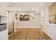 Spacious living room showcasing hardwood floors and modern decor at 1015 Auburn Dr, Erie, CO 80516