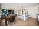 Open concept kitchen, dining, and living room area, ideal for Gathering living and entertaining at 1015 Auburn Dr, Erie, CO 80516