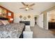 Serene main bedroom boasts natural light, large windows, and access to the main bathroom at 1015 Auburn Dr, Erie, CO 80516