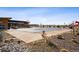 Community pool covered for the off-season near clubhouse in an upscale neighborhood at 1015 Auburn Dr, Erie, CO 80516