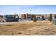 Highlands Elementary School exterior view with parking lot, school sign, and manicured lawn at 1015 Auburn Dr, Erie, CO 80516