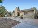 Backyard with a fire pit and seating area for outdoor enjoyment, as well as a well-maintained lawn at 4063 S Cathay Ct, Aurora, CO 80013