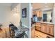 Stylish kitchen featuring granite countertops, light wood cabinets and breakfast bar seating at 4063 S Cathay Ct, Aurora, CO 80013