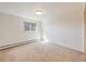 Bright bedroom with a window allowing natural light, creating a warm and inviting atmosphere at 13640 W Center Dr, Lakewood, CO 80228