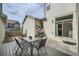 Outdoor patio area with dining table and chairs, perfect for outdoor entertaining, sliding glass door access at 11270 E 26Th Ave, Aurora, CO 80010