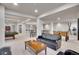 Finished basement with recreation area including pool table, seating, bar and foosball at 25 Summit Ash, Littleton, CO 80127