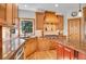 Well-equipped kitchen featuring stone countertops, stainless steel appliances, and ample cabinet space at 25 Summit Ash, Littleton, CO 80127