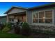 Spacious backyard featuring a patio, hot tub, and lush landscaping at 22065 E Bailey Pl, Aurora, CO 80016