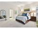 Large bedroom featuring a mirror, art, shuttered windows and an en suite bathroom at 22065 E Bailey Pl, Aurora, CO 80016