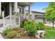 Charming home with stone accents, landscaped yard, and inviting front porch at 22065 E Bailey Pl, Aurora, CO 80016