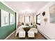 Bright bedroom showcasing a well-made bed, fresh greens, and calming aesthetic at 1220 S Vine St, Denver, CO 80210