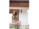Close-up of a classic front door with wood trim and visible house number: 1220 at 1220 S Vine St, Denver, CO 80210
