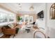 Bright living room with large windows, modern furniture, and a cozy, inviting atmosphere at 1220 S Vine St, Denver, CO 80210