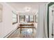 Bright office filled with warm light featuring a charming desk and hardwood flooring at 1220 S Vine St, Denver, CO 80210