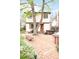 Brick patio featuring a shaded space with a hot tub at 1220 S Vine St, Denver, CO 80210