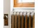 Intricate radiator design next to window at 1220 S Vine St, Denver, CO 80210