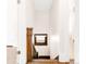 Stairway with dark wood and natural light at 1220 S Vine St, Denver, CO 80210