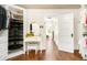 Spacious walk-in closet with built-in shelving, vanity, and natural light at 1220 S Vine St, Denver, CO 80210