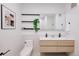 Modern bathroom featuring a double sink vanity, sleek fixtures, and stylish decor, offering a luxurious feel at 1601 Park Ave # 214, Denver, CO 80218