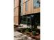 Apartment complex exterior with modern wood and metal accents, enhancing curb appeal and property value at 1601 Park Ave # 214, Denver, CO 80218