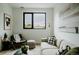 Comfortable living room featuring a cozy sofa, natural light and stylish decor, creating a relaxing atmosphere at 1601 Park Ave # 214, Denver, CO 80218