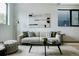 Stylish living room featuring a contemporary design, modern art, and comfortable seating at 1601 Park Ave # 214, Denver, CO 80218