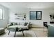 Living room with neutral tones, stylish decor and modern accents, perfect for cozy relaxation at 1601 Park Ave # 214, Denver, CO 80218