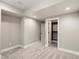 Bedroom showcasing an open closet, carpet, neutral paint, and trim, offering versatility at 1505 Castlecombe Ln, Monument, CO 80132