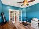 Bright office with a telescope, a printer and glass french doors that let light in at 1505 Castlecombe Ln, Monument, CO 80132
