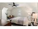 Bright bedroom featuring a comfortable bed, soft lighting, and a peaceful ambiance at 2843 Havana St, Denver, CO 80238