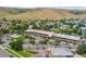 Commercial and residential areas from an aerial view in a suburban location at 1670 S Deframe St # B2, Lakewood, CO 80228