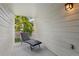 Outdoor balcony featuring white vinyl siding and a lounge chair for relaxation at 1670 S Deframe St # B2, Lakewood, CO 80228