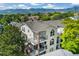 Exterior shot of a three story condo with multiple balconies and mountain views at 1670 S Deframe St # B2, Lakewood, CO 80228