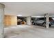 Well-lit parking garage with assigned spaces and storage options at 1670 S Deframe St # B2, Lakewood, CO 80228