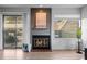 Cozy living room with gas fireplace, sliding door access, and outdoor views create a relaxing atmosphere at 6844 Countryside Ln # 284, Niwot, CO 80503