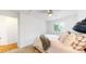Bright bedroom featuring a comfy bed, ceiling fan and bright walls at 12201 N Holly Way, Brighton, CO 80602