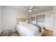 Bright bedroom featuring a comfy bed, closet space, and a ceiling fan at 12201 N Holly Way, Brighton, CO 80602