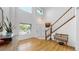 Inviting entryway featuring hardwood floors and natural light at 12201 N Holly Way, Brighton, CO 80602