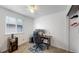 Office space with a modern desk and shoe rack at 12201 N Holly Way, Brighton, CO 80602