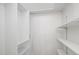 Walk-in closet equipped with shelving and storage solutions for efficient organization at 2082 S Helena St # C, Aurora, CO 80013