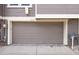 Garage door with a concrete driveway at 2082 S Helena St # C, Aurora, CO 80013