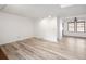 Bright living room featuring light-toned flooring and white walls at 2082 S Helena St # C, Aurora, CO 80013