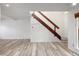 Bright, open space with modern wood flooring and stairs at 2082 S Helena St # C, Aurora, CO 80013