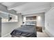 Cozy bedroom featuring a full bed, two bedside tables, and a closet at 33 Corona St # 207, Denver, CO 80218