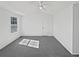 Bright bedroom featuring vaulted ceilings, a ceiling fan, and neutral decor at 9515 Bexley Dr, Highlands Ranch, CO 80126