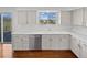 Bright kitchen with white countertops, cabinets, and stainless steel appliances at 9515 Bexley Dr, Highlands Ranch, CO 80126